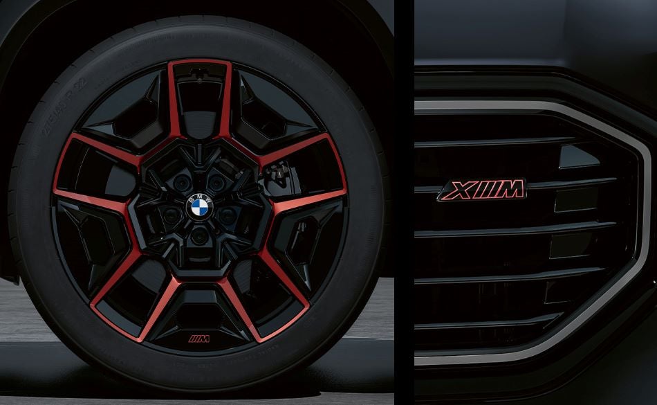 Detailed images of exclusive 22” M Wheels with red accents and XM badging on Illuminated Kidney Grille. in BMW of Akron | Akron OH